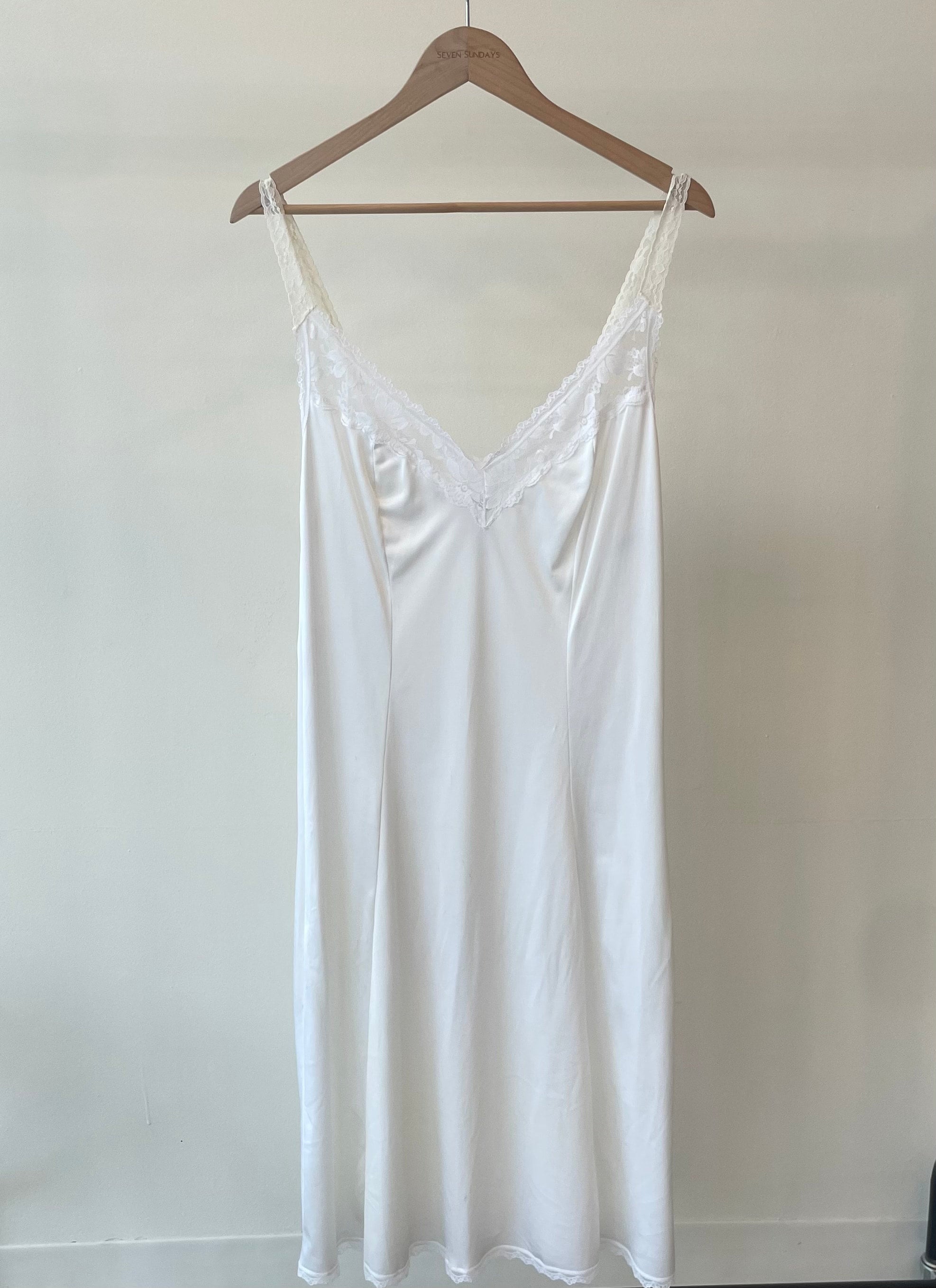 How to Wear a White Satin Midi Skirt Without Looking Like You're Heading to a Wedding